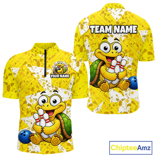 Front and back views of a bright yellow bowling quarter zip shirt with abstract splatter patterns, featuring a cheerful cartoon turtle holding bowling pins and a blue bowling ball graphic.