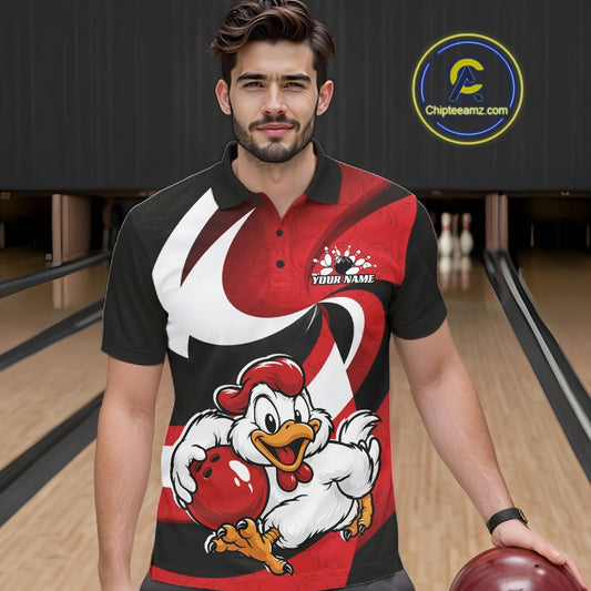 A man in a bowling alley wearing a custom black and red short-sleeve bowling shirt with a cartoon chicken graphic and 'YOUR NAME' text on the chest.