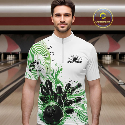 Male model wearing a white and green bowling quarter-zip shirt at the lane with musical wave graphics and bowling strike artwork.