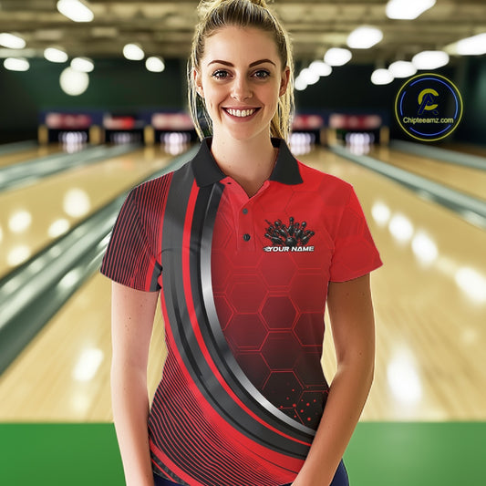 Female model in a bowling alley wearing a black and red polo shirt with honeycomb texture and a dynamic flame bowling strike graphic.