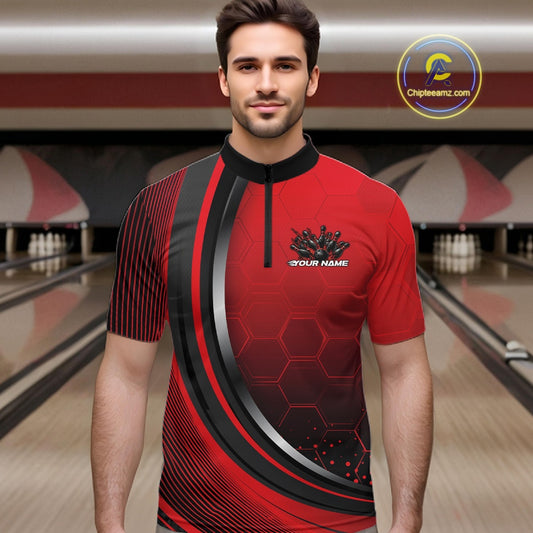 Male model in a bowling lane wearing a black and red quarter zip shirt with honeycomb texture and a flaming bowling strike graphic.