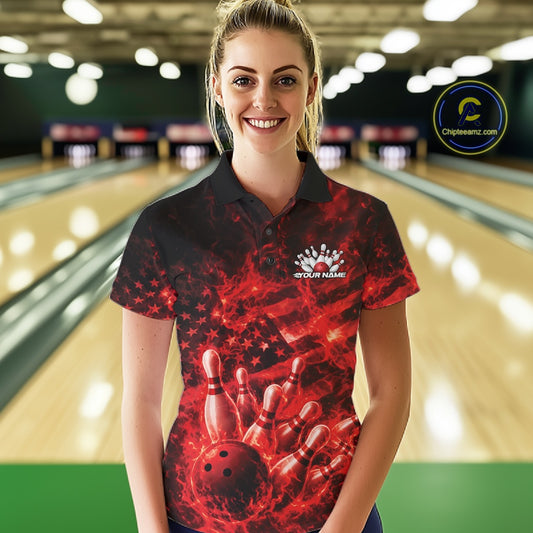 Female model wearing a black and red bowling polo at the bowling lane with fiery bowling action graphics.