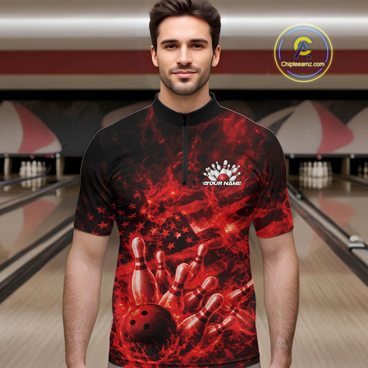 Male model in a bowling center wearing a black and red quarter-zip with fiery bowling-themed graphics and patriotic elements.