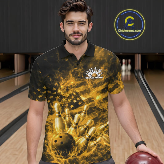 Male model in a bowling center wearing a black and yellow polo with fiery patriotic bowling artwork.
