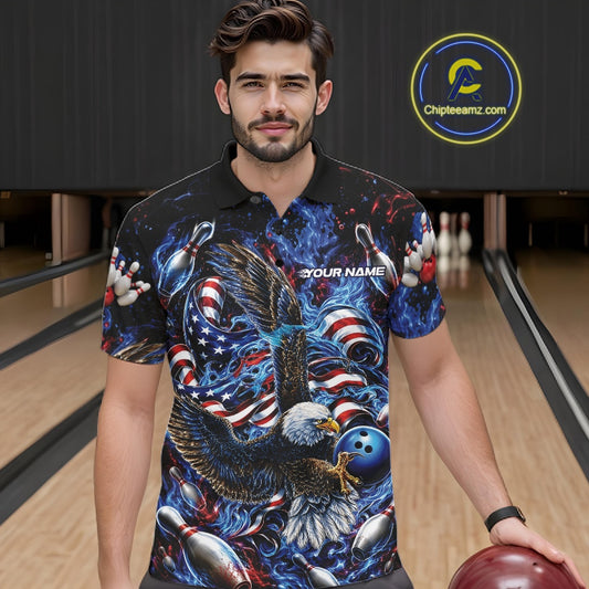 Front view of a male model in a bowling lane wearing a polo shirt with flaming bald eagle, blue bowling ball, American flag, and blue flames.