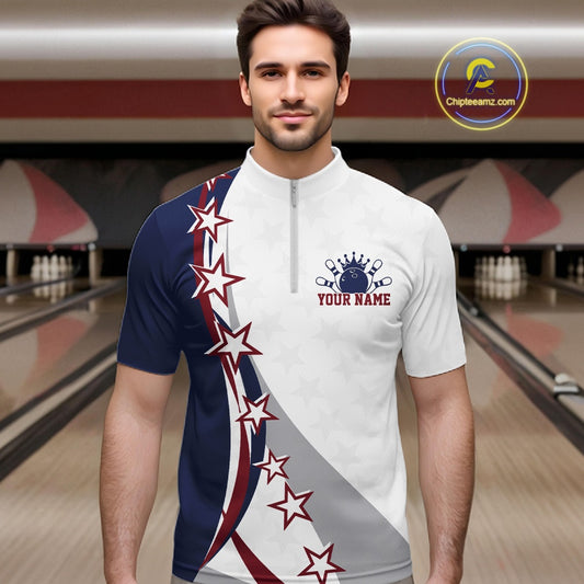 Male model front view at the bowling lane wearing a red, white, and blue bowling quarter zip shirt with sweeping stars and stripes.