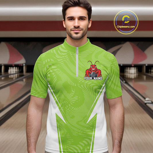 Front view of a male model in a bowling alley wearing a light green custom quarter-zip bowling shirt with a funny aggressive crawfish holding a bowling ball in a sportswear-style design.