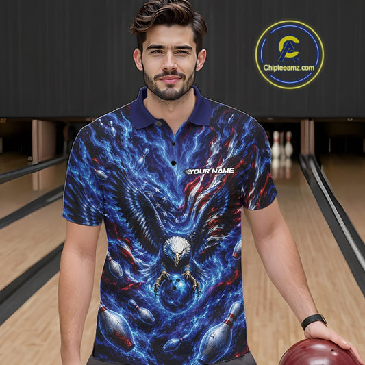 Front view of a male model at a bowling lane wearing a polo shirt with eagle graphics, bowling ball, flowing flag details, and pins.