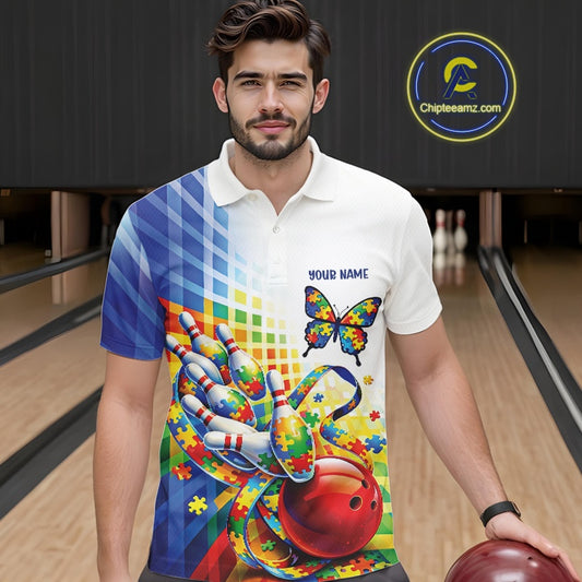 Male model in a bowling lane wearing a white and blue polo shirt, front view featuring puzzle pattern bowling, butterfly, and swirling ribbon graphics