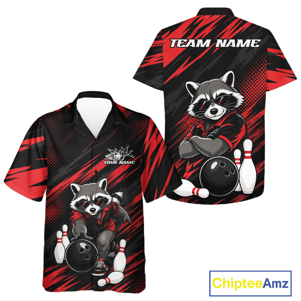 Front and back views of a short-sleeve bowling-themed button-up shirt on a white background. The shirt features a black and red abstract brushstroke pattern with a cartoon raccoon wearing sunglasses, bowling balls, and white bowling pins.