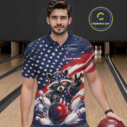Front view of a male model wearing a bowling polo shirt with a patriotic raccoon, bowling action scene, and flowing American flag artwork inside a bowling lane.