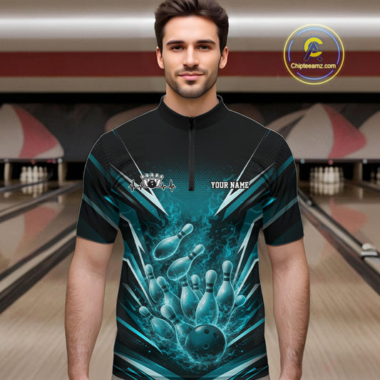 Male model in bowling lane wearing quarter-zip shirt with flaming bowling ball striking pins turquoise blue dynamic sports artwork