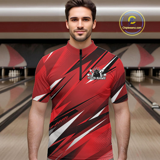 Man wearing a red bowling shirt with a personalized design in a bowling alley.