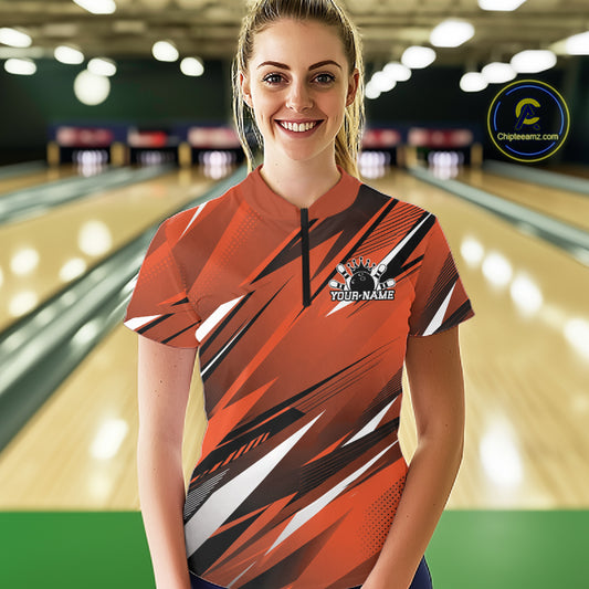 Woman wearing a custom bowling shirt with a logo and text in a bowling alley.