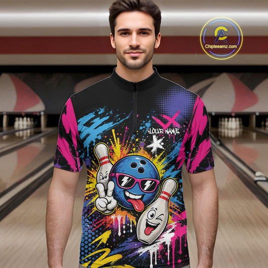 A man wearing a short-sleeve bowling-themed graphic quarter zip shirt with colorful print featuring a cartoon bowling ball and pins