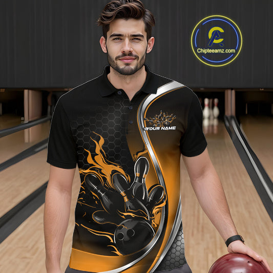 Male model seen from the front in a bowling lane wearing a black and yellow polo shirt featuring a flame bowling ball and pins design in a dynamic sports action scene.