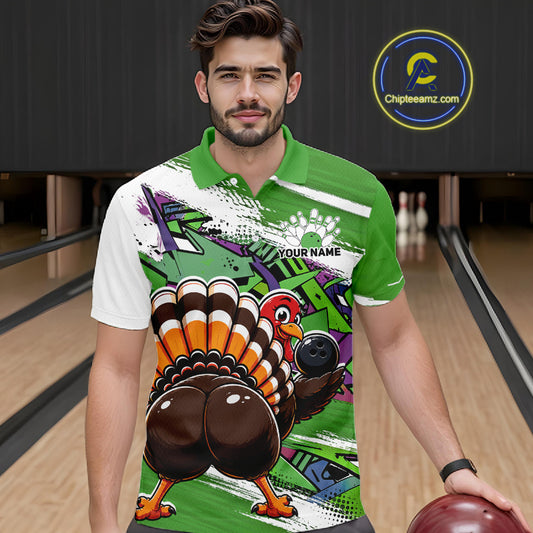 Front view of a male model wearing a green custom bowling polo shirt featuring a funny graffiti style turkey holding a bowling ball, paint splatter details, and a custom name in a bowling alley.