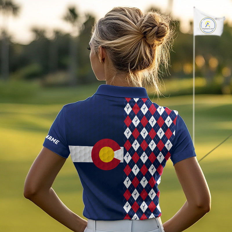 Female golfer wearing Colorado patriotic golf polo at country club, stylish golf apparel for tournaments and mountain golf trips.