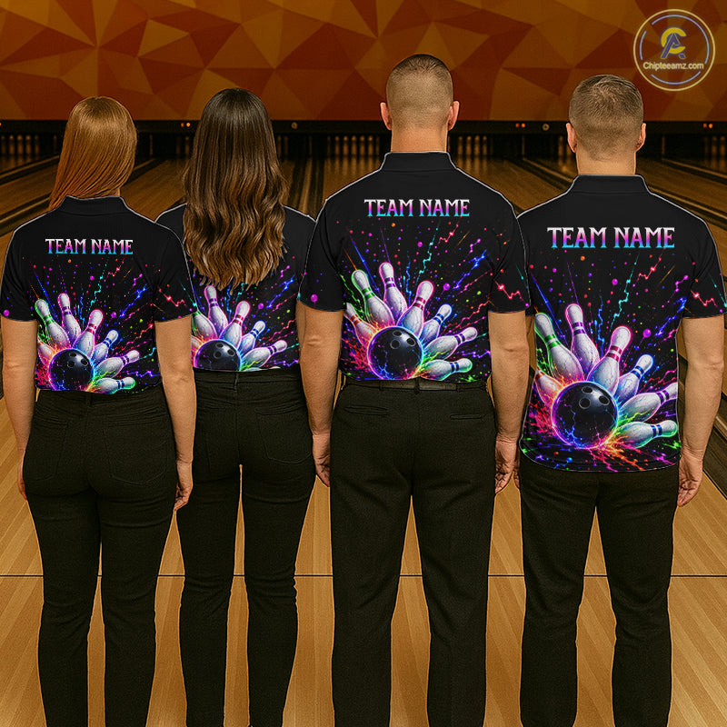 Four people wearing black shirts with colorful bowling designs and 'TEAM NAME' text on a bowling alley background.