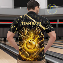 Load image into Gallery viewer, Male model wearing a custom black gold bowling quarter-zip shirt back view displaying the personalized team name above a glowing bowling ball with lightning energy artwork at the bowling alley