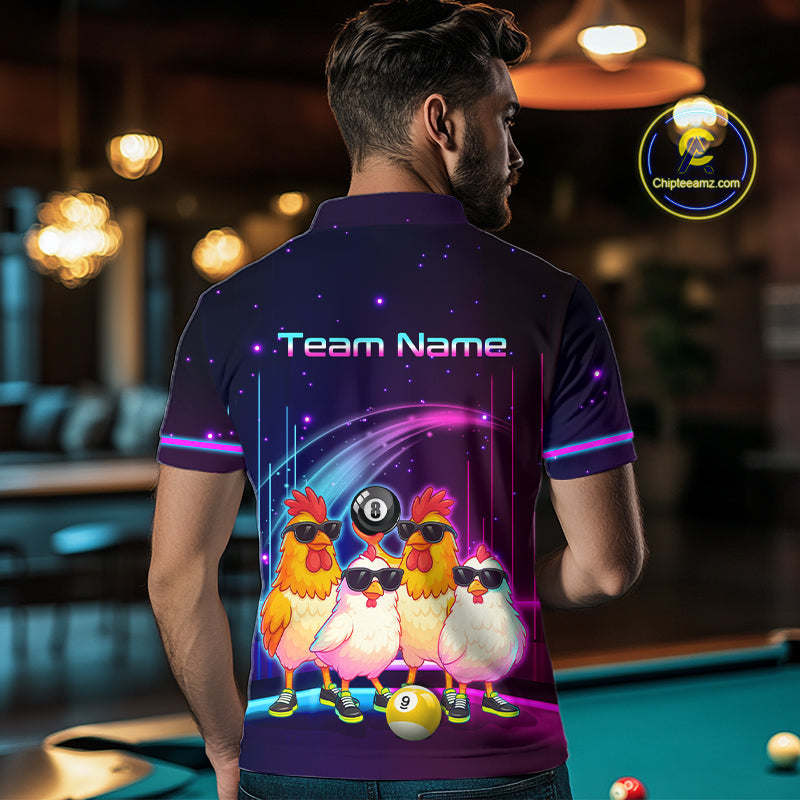 A man viewed from behind wearing a custom dark purple polo shirt with a colorful graphic of three cartoon chickens wearing sunglasses and a 8-ball on their heads, with 'Team Name' printed on the back. The background is a blurred pool hall with a pool table visible.