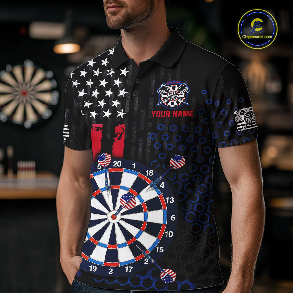 Male model wearing a custom black darts polo shirt featuring an American flag star pattern, a large dartboard graphic, and customizable 'YOUR NAME' text on the chest