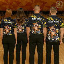 Load image into Gallery viewer, Group of four wearing custom black yellow bulldog bowling shirts back view featuring a bowling ball, beer mug and yellow paint splash pattern, displaying Team Name, at the bowling alley