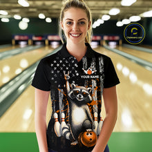 Load image into Gallery viewer, Woman wearing a black shirt with a raccoon graphic in a bowling alley.