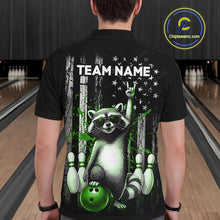 Load image into Gallery viewer, Person wearing a black t-shirt with a raccoon graphic and 'Team Name' text in a bowling alley.
