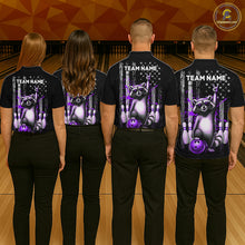 Load image into Gallery viewer, Four people wearing black shirts with a raccoon graphic and 'Team Name' text on a bowling alley background.