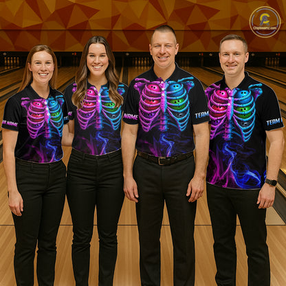 Four people standing together in a bowling alley wearing matching black short-sleeve shirts with a colorful neon ribcage graphic on the front. The shirts feature pink, blue, purple, and green glowing skeletal rib designs, and the background shows bowling lanes and pins.
