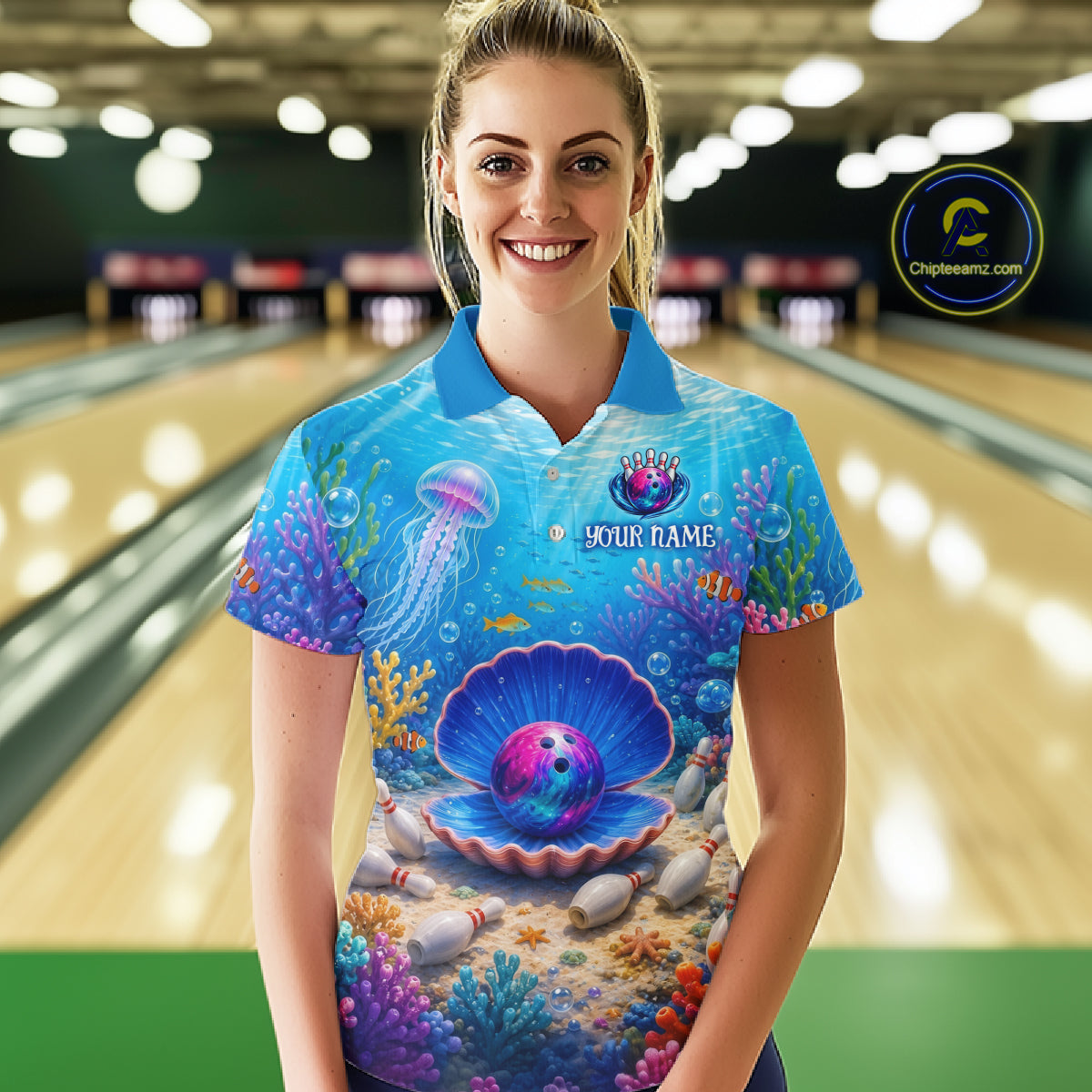 Person wearing a colorful bowling shirt with an ocean-themed design in a bowling alley.