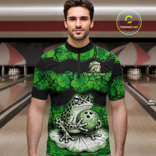 Load image into Gallery viewer, A man wearing a green and black bowling-themed quarter-zip shirt with a frog and bowling ball graphic, set against a bowling alley background. A 'Chiletaniz.