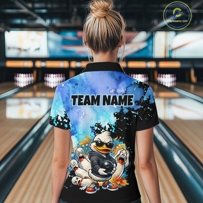 Person wearing a bowling shirt with cartoon characters and 'Team Name' text in a bowling alley.