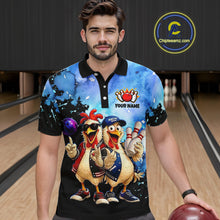Load image into Gallery viewer, Man wearing a colorful polo shirt with cartoon chickens and bowling elements in a bowling alley.