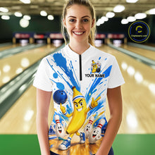 Load image into Gallery viewer, Person wearing a colorful bowling shirt with cartoon characters in a bowling alley.