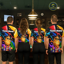 Load image into Gallery viewer, Four people wearing colorful sports jerseys with a cartoon character on the back in an indoor setting.