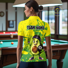 Load image into Gallery viewer, Person wearing a yellow and green shirt with a cartoon avocado character and 'Team Name' text in a pool hall.