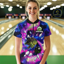 Load image into Gallery viewer, Person wearing a colorful bowling shirt with a turtle design in a bowling alley.