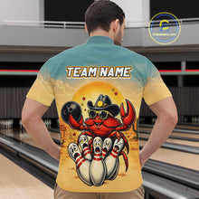 Load image into Gallery viewer, Person wearing a shirt with a colorful design of a crab bowling at a bowling alley.
