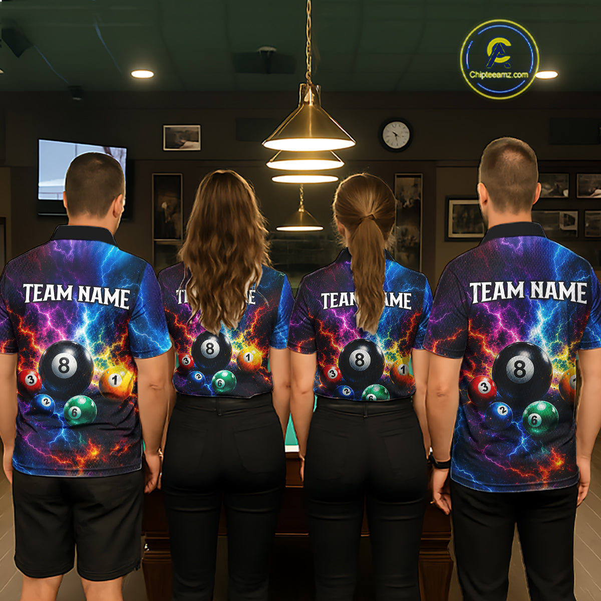 Four people wearing matching sports jerseys with colorful ball designs and 'Team Name' text in a casual setting.