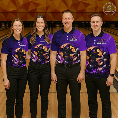 Four people standing in a bowling alley wearing matching purple custom bowling shirts with a black cat wearing a witch hat graphic, paired with black pants.