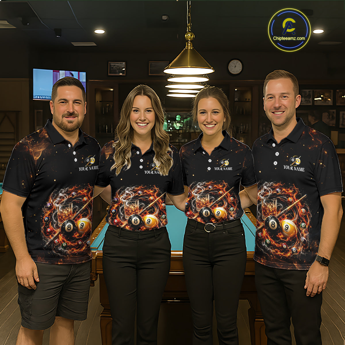 Four people wearing matching polo shirts with a pool ball design in a bar setting.