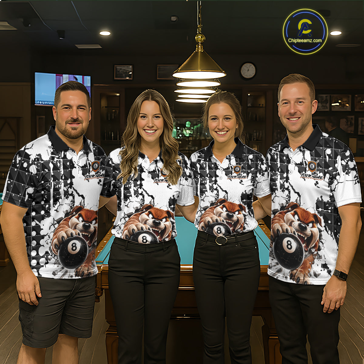 Four people wearing matching billiard shirts with a dog and ball design in a pool hall.
