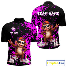 Load image into Gallery viewer, Front and back views of a black short-sleeve zip-up polo shirt with a bright purple paint splatter design and a cartoon monkey wearing sunglasses and an orange cap, with customizable text areas on the chest and back.