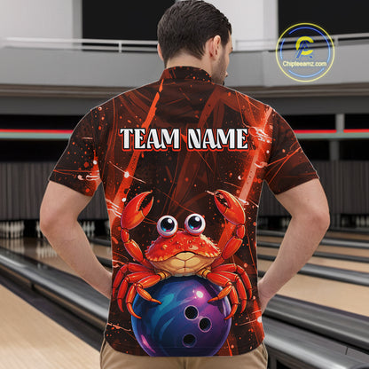 Person wearing a bowling shirt with a red crab and bowling ball design, standing in a bowling alley.