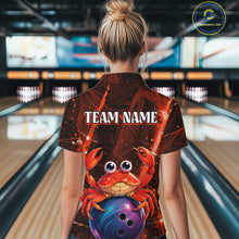 Load image into Gallery viewer, Person wearing a bowling shirt with a crab design and 'TEAM NAME' text in a bowling alley.