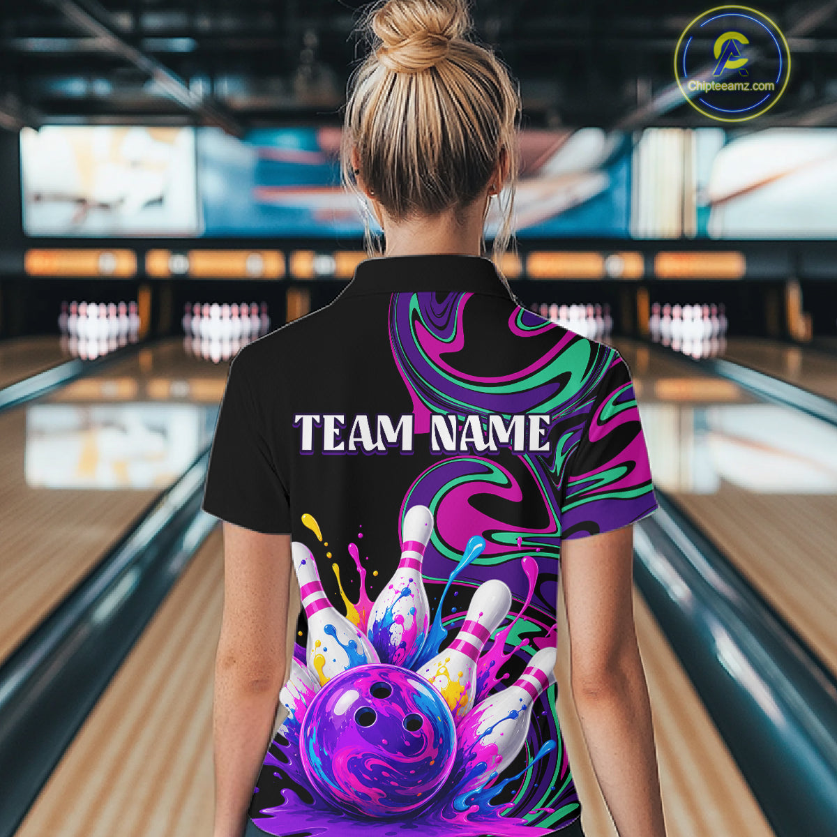 Person wearing a bowling-themed shirt with 'TEAM NAME' text in a bowling alley.