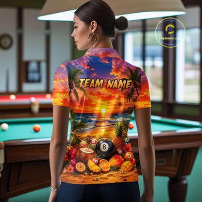 Woman wearing a colorful shirt with a tropical design and 'TEAM NAME' text in a pool hall.