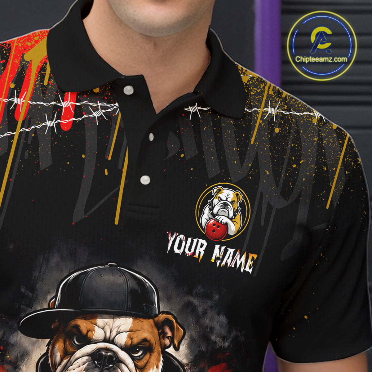 Close-up front view of custom black bulldog bowling polo shirt showing Your Name, fierce cartoon bulldog graphic and paint drip pattern